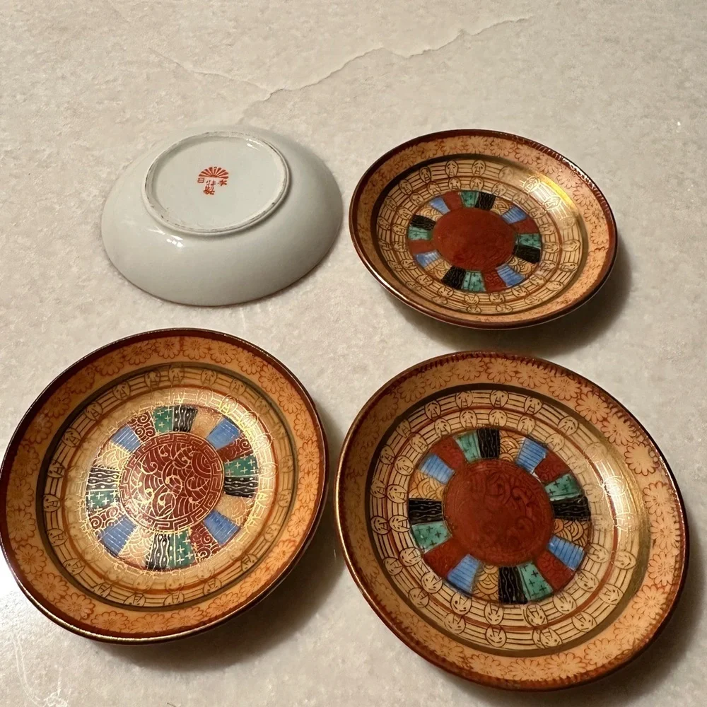 Vintage set of 4 small saucers. Hand painted 1000 faces